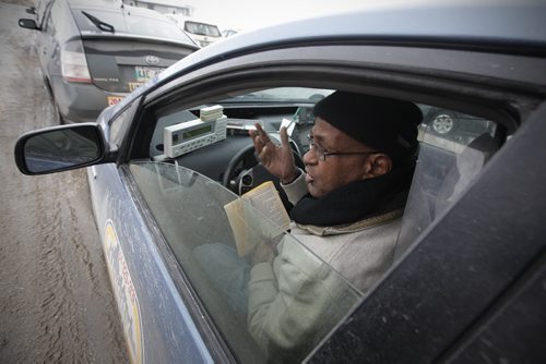 January124, 2014 - 140112  -  Cab driver Awoke Chekole speaks about the province's policy change forcing drivers to ensure their clients get into their homes safely after they have been discharged from hospital Sunday, January 12, 2014. This policy change comes after two recent deaths in Winnipeg. John Woods / Winnipeg Free Press