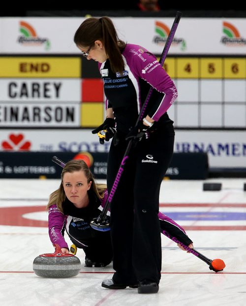 Chelsea Carey throws a rock against Kerri Einarson during the final of the Scotties Provincial Curling Championship at the Tundra Oil & Gas Place in Virden, Manitoba, Sunday, January 12, 2014. (TREVOR HAGAN/WINNIPEG FREE PRESS)