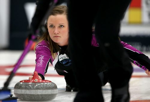 Chelsea Carey throws a rock against Kerri Einarson during the final of the Scotties Provincial Curling Championship at the Tundra Oil & Gas Place in Virden, Manitoba, Sunday, January 12, 2014. (TREVOR HAGAN/WINNIPEG FREE PRESS)