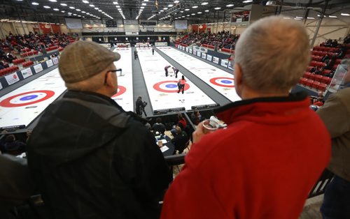 Curling fans look on as Chelsea Carey faces Kerri Einarson during the final of the Scotties Provincial Curling Championship at the Tundra Oil & Gas Place in Virden, Manitoba, Sunday, January 12, 2014. (TREVOR HAGAN/WINNIPEG FREE PRESS)