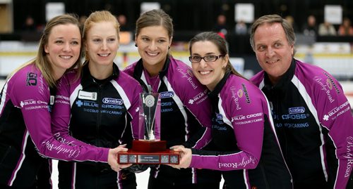 Chelsea Carey and her rink, Kristy McDonald, Kristen Foster, Lindsay Titheridge and coach Dan Carey celebrate after defeating Kerri Einarson in the final of the Scotties Provincial Curling Championship at the Tundra Oil & Gas Place in Virden, Manitoba, Sunday, January 12, 2014. (TREVOR HAGAN/WINNIPEG FREE PRESS)