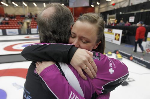 Father and coach, Dan Carey celebrates with Chelsea Carey after defeating Kerri Einarson in the final of the Scotties Provincial Curling Championship at the Tundra Oil & Gas Place in Virden, Manitoba, Sunday, January 12, 2014. (TREVOR HAGAN/WINNIPEG FREE PRESS)