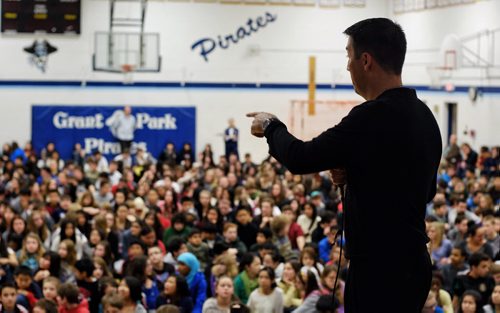 RCMP Constable Tad Milmine talks to a gym full of students at Grant Park High School about growing up a victim of bullying.  140113 - January 13, 2014 MIKE DEAL / WINNIPEG FREE PRESS
