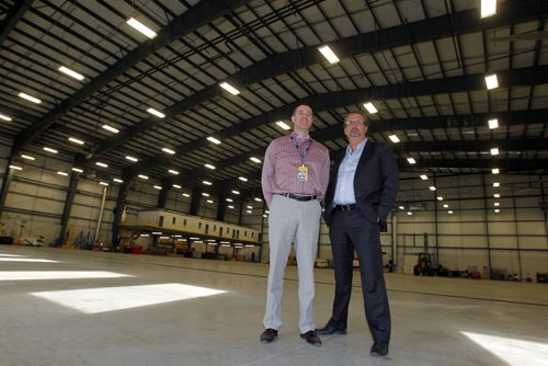 The new Calm Air hangar where several planes can fit in and be worked on. Gary Bell and Mike Pyle.  BORIS MINKEVICH / WINNIPEG FREE PRESS January 14, 2014