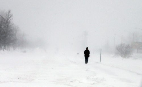 Stdup , Windy and Wild  , high winds and blowing slow caused white out conditions across Wpg  and for this person walking along the bicycle path along Gateway RD. JAN. 15 2014 / KEN GIGLIOTTI / WINNIPEG FREE PRESS