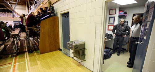 Basketball referee's Wayne Banfield and Stewart McKenzie (left) travel rural manitoba regularly in all types of weather to officiate matches in high school gyms. Stewart and Wayne (right) take a break between quarters in a gym teachers office / change room at a match between the Carman Cougars and the Gretna Blues. See Nick Martin story. January 14, 2014 - (Phil Hossack / Winnipeg Free Press)
