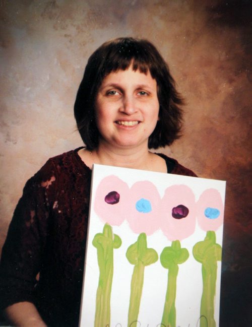 Melanie Halprin, 21, has autism and is non-verbal, except for reactive single words. Her family creates art cards with her works on it as thank you cards to give to people. One of these was sent to a friend in the Netherlands where it was seen by a local artist. Because the artist was impressed with her work, two pieces of Melanies art ended up being part of an art show in Amsterdam where something like 7,000 people saw it. FAMILY PHOTO/ BORIS MINKEVICH / WINNIPEG FREE PRESS January 15, 2014