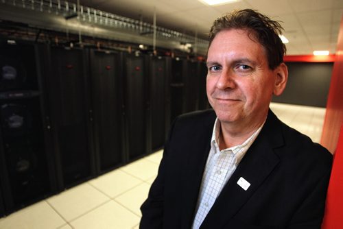Eugene Roman the CTO at Canadian Tire inside one of the computer servers in the new $50 million Data Centre at Portage and Carlton. 140116 - January 16, 2014 MIKE DEAL / WINNIPEG FREE PRESS