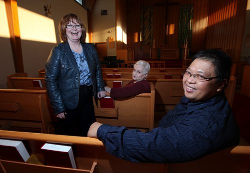 Left to right, Cathy Horbas and Carol Allen of Christ Lutheran and Carlito Arceo of Living Christ Church on Inkster Bvld.  Christ Lutheran church closing, and selling the facility to Filipino congregation Living Christ Community Church. See Brenda Suderman's story.  January 16, 2014 - (Phil Hossack / Winnipeg Free Press)