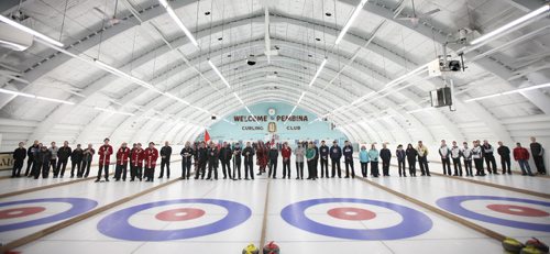 Curlers of all ages and gender form a line across the Pembina Curling Club for the opening ceremonies at the 126th Manitoba Open Bonspiel formerly the MCA Bonspiel. Melissa Martin's story. January 16, 2014 - (Phil Hossack / Winnipeg Free Press)
