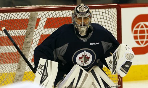 Jets goalie Ondrej Pavelec  , Winnipeg Jets  practice  MTS Centre  -Jets and new coach Paul Maurice  prepare  for Saturday 1pm home game with the Edmonton Oilers JAN. 17 2014 / KEN GIGLIOTTI / WINNIPEG FREE PRESS . JAN. 17 2014 / KEN GIGLIOTTI / WINNIPEG FREE PRESS