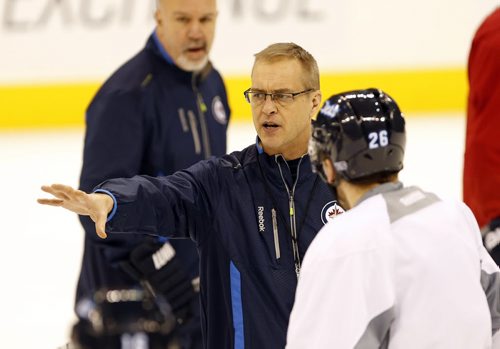 Paul Maurice  talks with #26 Patrice Cormier  , Winnipeg Jets  practice  MTS Centre  -Jets and new coach Paul Maurice  prepare  for Saturday 1pm home game with the Edmonton Oilers JAN. 17 2014 / KEN GIGLIOTTI / WINNIPEG FREE PRESS . JAN. 17 2014 / KEN GIGLIOTTI / WINNIPEG FREE PRESS