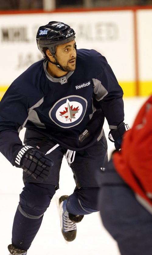 Dustin Byfuglien playing forward -  , Winnipeg Jets  practice  MTS Centre  -Jets and new coach Paul Maurice  prepare  for Saturday 1pm home game with the Edmonton Oilers JAN. 17 2014 / KEN GIGLIOTTI / WINNIPEG FREE PRESS . JAN. 17 2014 / KEN GIGLIOTTI / WINNIPEG FREE PRESS