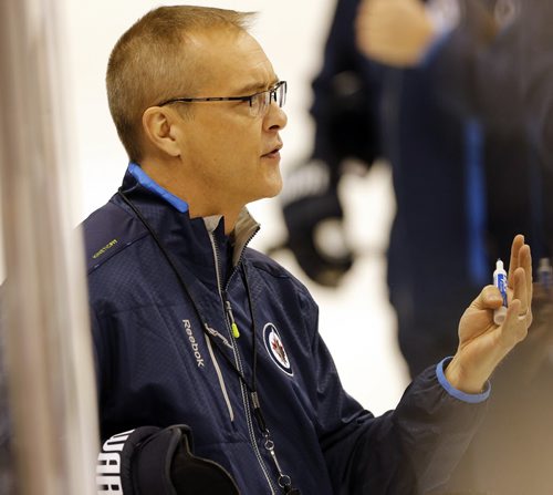 Coach Paule Maurice during practice -  , Winnipeg Jets  practice  MTS Centre  -Jets and new coach Paul Maurice  prepare  for Saturday 1pm home game with the Edmonton Oilers JAN. 17 2014 / KEN GIGLIOTTI / WINNIPEG FREE PRESS . JAN. 17 2014 / KEN GIGLIOTTI / WINNIPEG FREE PRESS