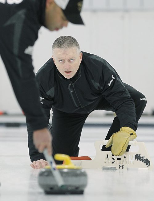 January 19, 2014 - 140119  -  Kevin Brown competes against Jose Loureiro in the Manitoba Open Bonspiel at Assiniboine Memorial Curling Club Sunday, January 19, 2014. John Woods / Winnipeg Free Press