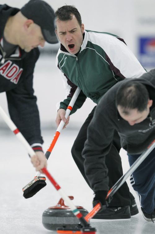 January 19, 2014 - 140119  -  Jose Loureiro competes against Kevin Brown in the Manitoba Open Bonspiel at Assiniboine Memorial Curling Club Sunday, January 19, 2014. John Woods / Winnipeg Free Press
