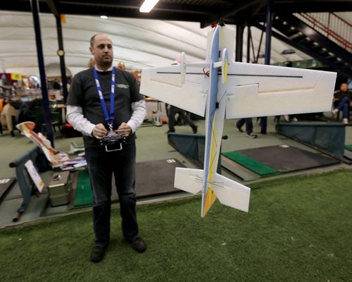 Marc Foucher flying one of his planes at The Golf Dome, Friday, January 17, 2014. (TREVOR HAGAN/WINNIPEG FREE PRESS) - for dave sanderson story