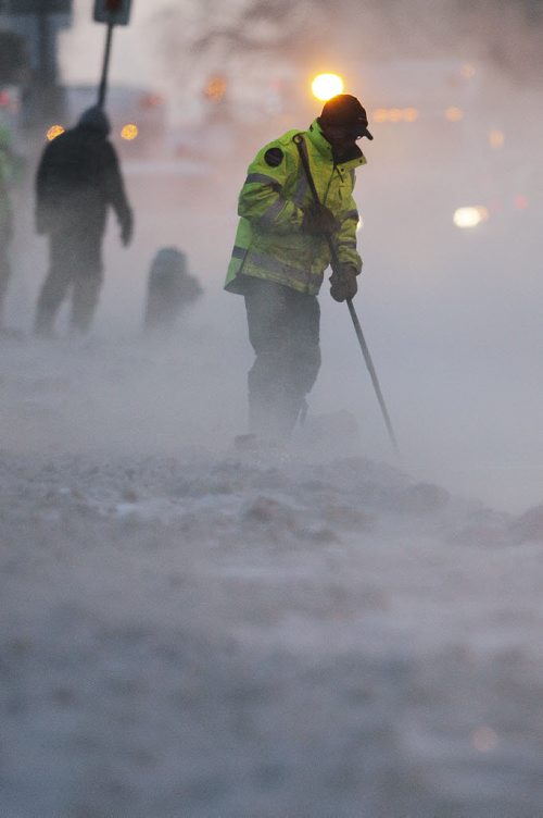January 20, 2014 - 140120  -  Crews were called to a water main break on Logan Avenue at Keewatin Street Monday, January 20, 2014. John Woods / Winnipeg Free Press