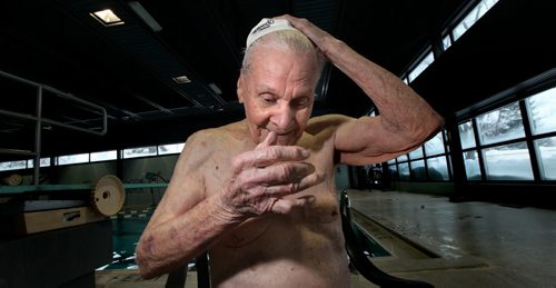 Jaring Timmerman, 105ys old,  peels off his Speedo Swim Cap after prepping for an upcoming swim competition. See story. January 21, 2014 - (Phil Hossack / Winnipeg Free Press)