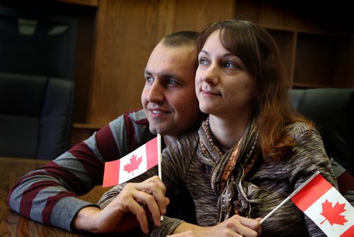 Anna Repina and Roman Plokhotniuk love their new adopted country of Canada after immigrating to Morden recently. See Bill Redekop's story.  Jan 21,, 2014 Ruth Bonneville / Winnipeg Free Press