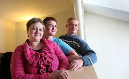 Eugenia (pink) Elyason, her husband Dmitry, son Daniel (blue) and daughter Alis (not available for photo) immigrated to Winkler from Isreal. See Bill Redekop's story.  Jan 21,, 2014 Ruth Bonneville / Winnipeg Free Press
