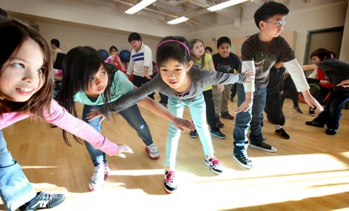 Grade three students from Greenway students do yoga during indoor recess because the cold temperatures do not allow them to have recess outside. Ashley Prest story.  Jan 22,, 2014 Ruth Bonneville / Winnipeg Free Press