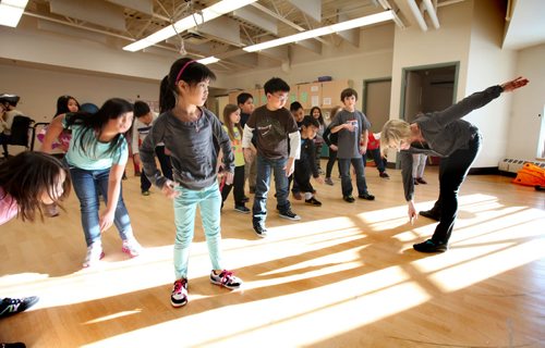 Grade three students from Greenway students do yoga during indoor recess because the cold temperatures do not allow them to have recess outside. Ashley Prest story.  Jan 22,, 2014 Ruth Bonneville / Winnipeg Free Press