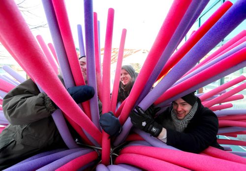 Raw Design  Inc- designers cozy up in one of their 3 unique and colourful warming huts that will be available for the public to try out along the River Trail soon during the annual The Warming Huts Architecture Competition on Ice at the Forks.  Names from left -  Pierre-Alexandre Le Lay, Asron Hendershott and Jacob Shank.    Jan 22,, 2014 Ruth Bonneville / Winnipeg Free Press