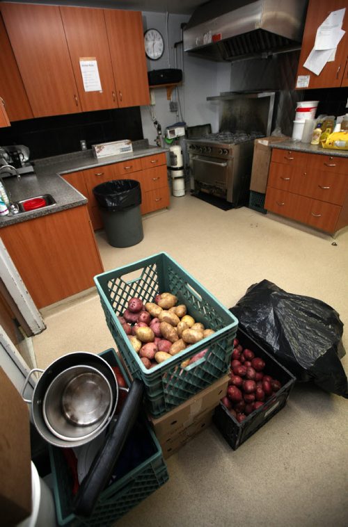 A tiny kitchen at The Main Street Project, turns out hundreds of meals for the Main Street Project, Mainstay and the Bell Hotel every day. See Randy Turner's tale re: Homelessness.  January 23, 2014 - (Phil Hossack / Winnipeg Free Press)
