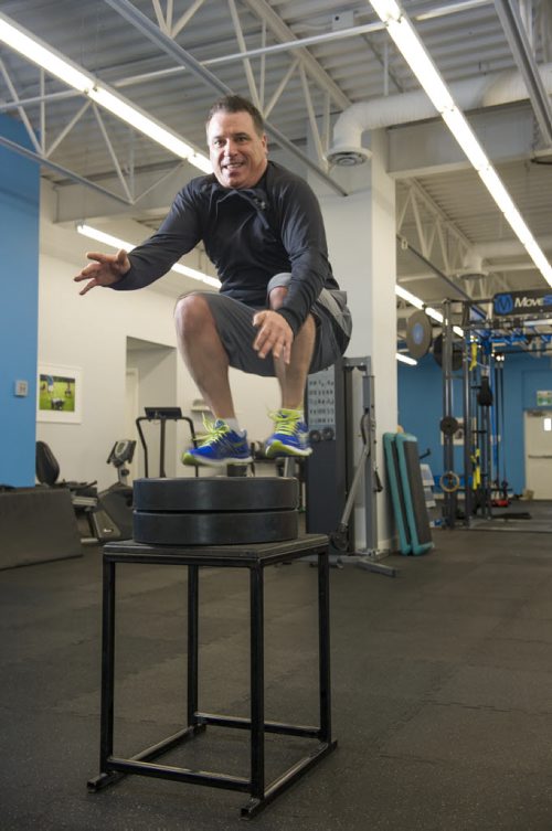 140125 Winnipeg - DAVID LIPNOWSKI / WINNIPEG FREE PRESS - January 25, 2014  Lawrence (Spatch) Mulhall, the executive director of Broadway Neighbourhood Centre, working out at Advantage Conditioning. Here is he doing the "box jump" where he jumps vertically onto the top of a box (with a flat surface). He is 55 years old and said he has a 34-inch vertical jump.   For Training Basket, Ashley Prest Story