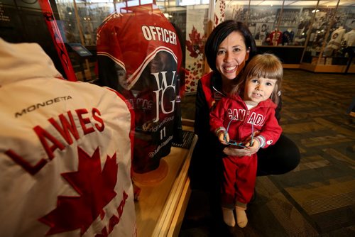 Jill Officer and her 2 year old daughter, Camryn, at the Manitoba Sports Hall of Fame, January 25, 2014. (TREVOR HAGAN/WINNIPEG FREE PRESS)