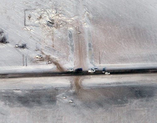 Aerial view of crews working on TransCanada Corporation natural gas pipeline to supply natural gas to residents of Otterburne and surrounding areas after a massive pipeline explosion in the early hours on Saturday morning East of Otterburne, Manitoba.  See story- Jan 27, 2014   (JOE BRYKSA / WINNIPEG FREE PRESS)