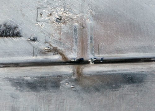 Aerial view of crews working on TransCanada Corporation natural gas pipeline to supply natural gas to residents of Otterburne and surrounding areas after a massive pipeline explosion in the early hours on Saturday morning East of Otterburne, Manitoba.  See story- Jan 27, 2014   (JOE BRYKSA / WINNIPEG FREE PRESS)