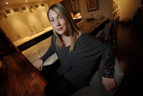 January 27, 2014 - 140127  - Emily Doer who is putting on her second fundraising Tea For Eating Disorder for the eating disorder unit at HSC is photographed in her home Monday, January 27, 2014. John Woods / Winnipeg Free Press
