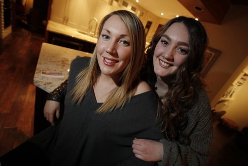 January 27, 2014 - 140127  - Emily Doer (L) who is putting on her second fundraising Tea For Eating Disorder for the eating disorder unit at HSC is photographed with her sister Kate in her home Monday, January 27, 2014. John Woods / Winnipeg Free Press