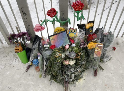 The memorial on the Osborne Bridge for murder victim Joshua Bentley age18. He was stabbed Friday night in an area not far from the Osborne Bridge. A 20-year-old man was also injured but survived, a male has been arested.     Wayne Glowacki / Winnipeg Free Press Jan.28  2014