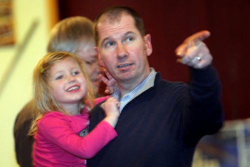 Shannon Martin and his four year old daughter Tess watch results come in en-route to wining the by-election in the Morris constituency Tuesday evenng. The LaSalle resident won the Conservative seat handily. The voter turnout was 26%. January 28, 2014 - (Phil Hossack / Winnipeg Free Press)