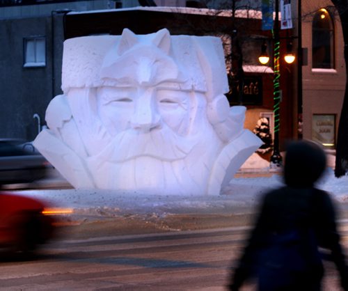 A smiling voyageur snow sculpture on Provencher Blvd. at St. Joseph St. Wednesday morning is a reminder for the up coming Festival du Voyageur Feb.14-23 which will be celebrating it's 45th anniversary. Wayne Glowacki / Winnipeg Free Press Jan.29  2014