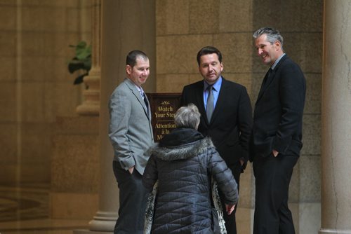 Manitoba PC leader Brian Pallister and  the two new MLA's  Shannon Martin (left) and Doyle Piwniuk are congratulated at the Leg Wednesday morning for their bi-election win by passerby on the steps of the Leg Wednesday morning,    Jan 29,, 2014 Ruth Bonneville / Winnipeg Free Press