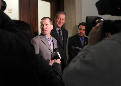 Manitoba PC leader Brian Pallister and  the two new MLA's,  Shannon Martin (left) and Doyle Piwniuk  talk to the media at the Leg Wednesday morning after their bi-election wining last night.   Jan 29,, 2014 Ruth Bonneville / Winnipeg Free Press