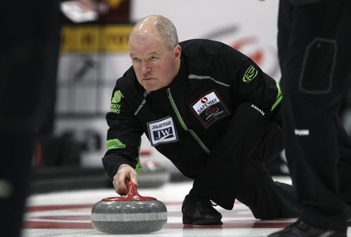 Draw 2 of the 2014 Safeway Championships at the MTS Iceplex in Winnipeg Wednesday morning  Skip Mark Lukowich from the West Kildonan CC yells instructions during play against  Randy Neufeld from the Pembina CC - See Paul Wiecek story- Jan 29, 2014   (JOE BRYKSA / WINNIPEG FREE PRESS)