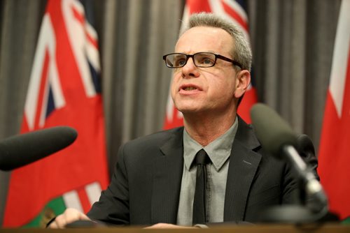James Allum, Minister of Education and Advanced Learning, making an education funding announcement at the Manitoba Legislative Building, Thursday, January 30, 2014. (TREVOR HAGAN/WINNIPEG FREE PRESS)