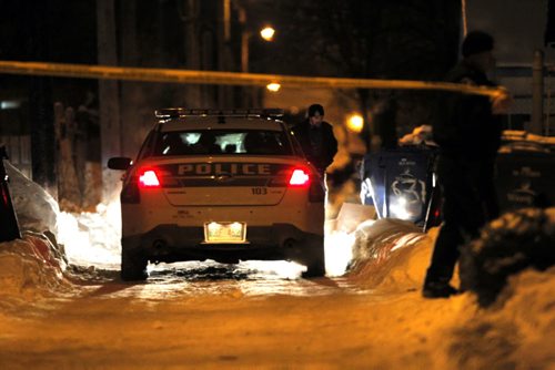 SHOOTING SCENE back lane behind 642 Magnus in the north end. House on Manitoba that the police surrounded. BORIS MINKEVICH / WINNIPEG FREE PRESS. JAN 30, 2014
