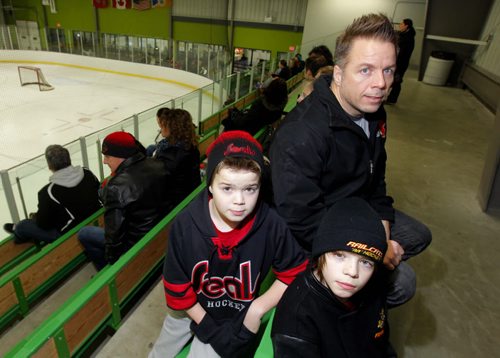 Jason Thor, president of St. Boniface Minor Hockey Association has two young boys in minor hockey. Evan and Alex. Story on Winnipeg Hockey thinking about introducing mandatory Respect in Hockey program for parents. Totally in favour of program. BORIS MINKEVICH / WINNIPEG FREE PRESS. JAN 31, 2014
