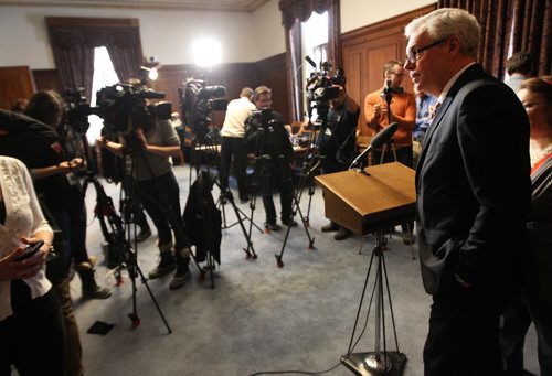 Manitoba Premier Greg Selinger made a s statement today in the cabinet room surrounded by a small potion of his caucus at  the Legislative Building. He announced that Christine Melnick  will be removed from caucus immediately over the recent controversy. - See Bruce Owen and Larry Kusch stories- Feb 04, 2014   (JOE BRYKSA / WINNIPEG FREE PRESS)