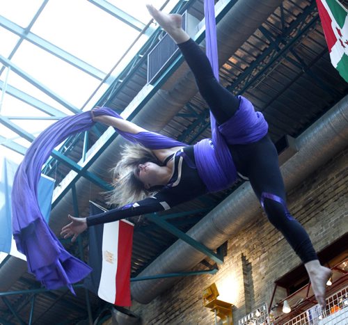 Aerialist Sara Shyiak and event coordinator of the upcoming Circus for Circus takes part in a preview performance at The Forks Wednesday morning.  The  Circus for Circus is a  fundraiser event for the Winnipeg International Children's Festival C.A.M.P. Program for inner-city kids held on February 21 7-11pm in the Manitoba Theatre for Young People lobby. The cocktail event includes performances from aerialists, hoop dancers and jugglers. Sara's six person Take Flight Aerial & Acrobatic Troupe will be at the fundraiser.  For story by intern Estefania.  Wayne Glowacki / Winnipeg Free Press Feb.5   2014
