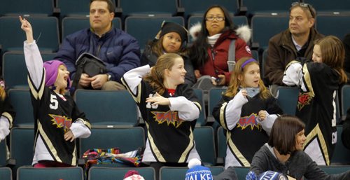 The 5th Annual Boston Pizza / Winnipeg Ringette League All-Star Games and Skills Competition at MTS Centre. Red River Rage players dance up a storm in the stands. BORIS MINKEVICH / WINNIPEG FREE PRESS. FEB 5, 2014