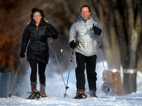 John Ford and his wife, Jennifer, snowshoe together Thursday. (The pair say working out together is a cornerstone of their relationship and has brought them closer together). See Shamona Harnett's story. February 6, 2014 - (Phil Hossack / Winnipeg Free Press)