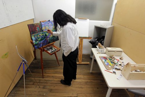 A 24-hour Art-a-thon kicked off is at 1 p.m. today at Artbeat Studio, 62 Albert Street. This evening Hai Romana is one of the artists participating. BORIS MINKEVICH / WINNIPEG FREE PRESS. FEB 6, 2014