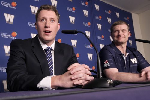 New Winnipeg Blue Bomber pivot Drew Willy, left with head coach Mike OShea, is officially announced as the new starting QB at a news conference Friday afternoon at Investors Group Stadium- The 215 lbs - 6 ft 3 American quarterback played for the University of Buffalo and remains the best passer in school history-    See Paul Wiecek story- Feb 07, 2014   (JOE BRYKSA / WINNIPEG FREE PRESS)